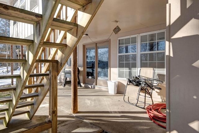 unfurnished sunroom with a healthy amount of sunlight