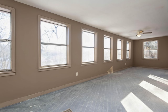 spare room featuring ceiling fan