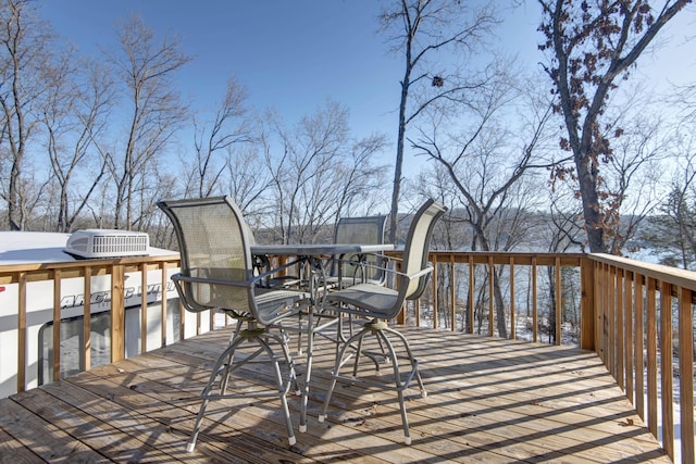 view of snow covered deck