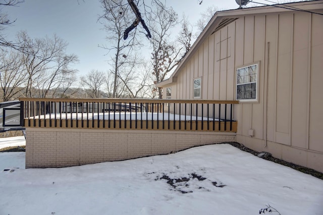 view of snow covered property