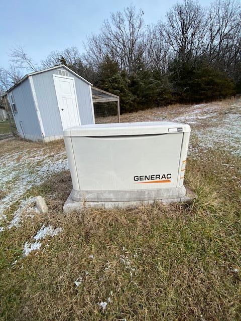 view of entry to storm shelter