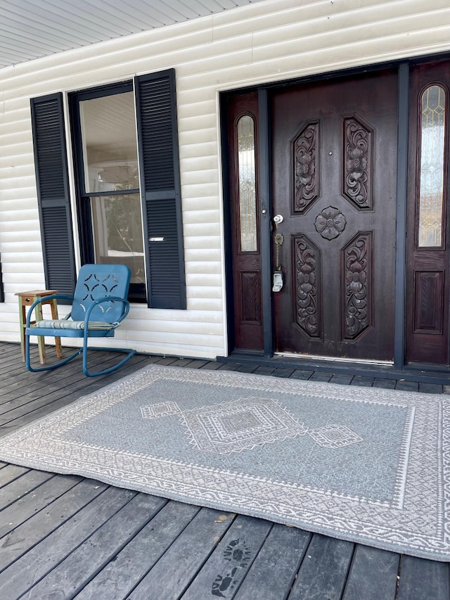 property entrance featuring covered porch