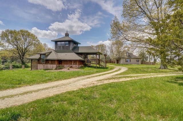 exterior space featuring a front lawn