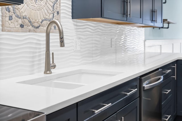 kitchen with sink and tasteful backsplash