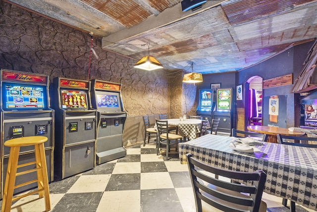 game room with wooden ceiling