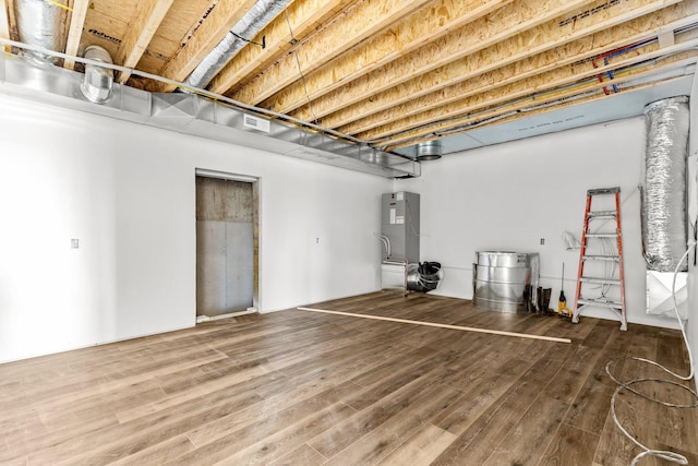 basement featuring wood-type flooring