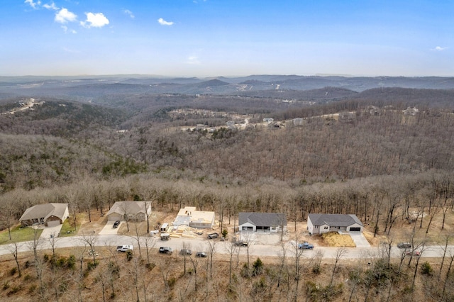 aerial view with a view of trees and a mountain view