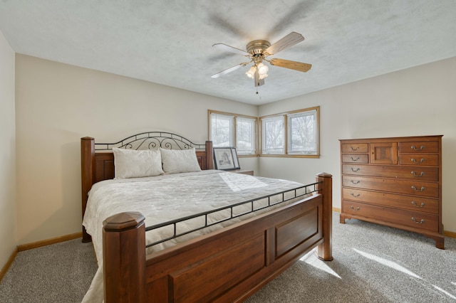 bedroom with light carpet and ceiling fan