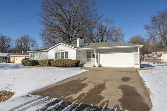 single story home featuring a garage