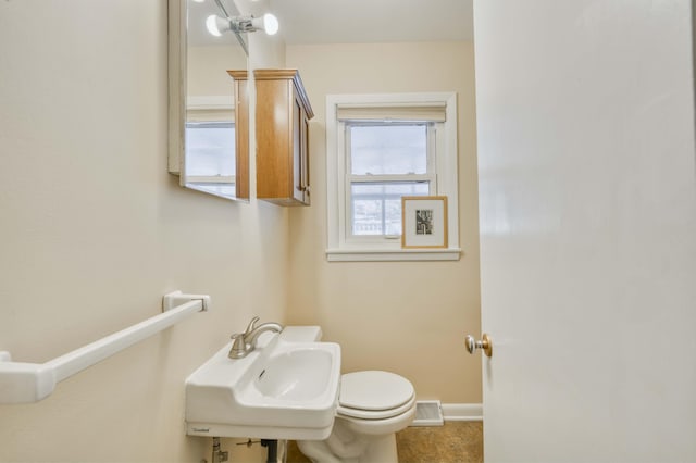 bathroom with sink and toilet