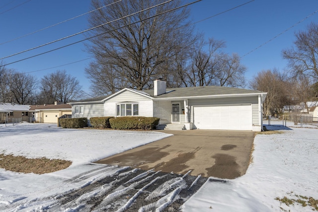 single story home featuring a garage