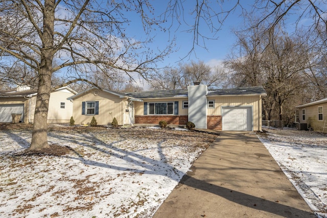 ranch-style home with a garage