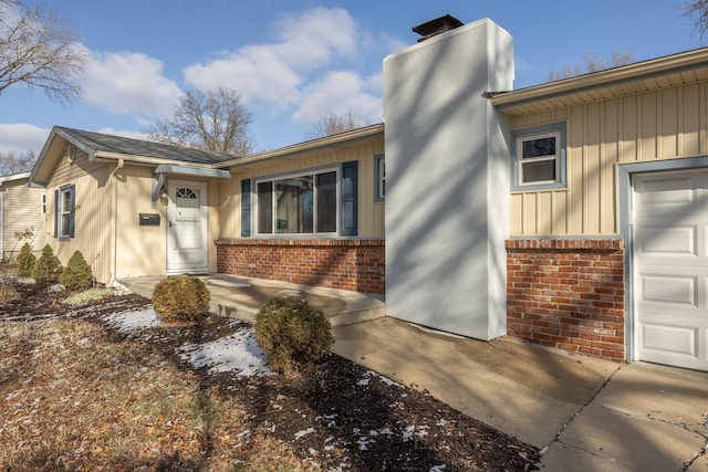 exterior space with a garage