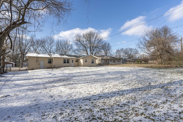 view of snow covered house