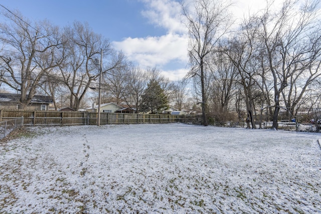 view of yard covered in snow