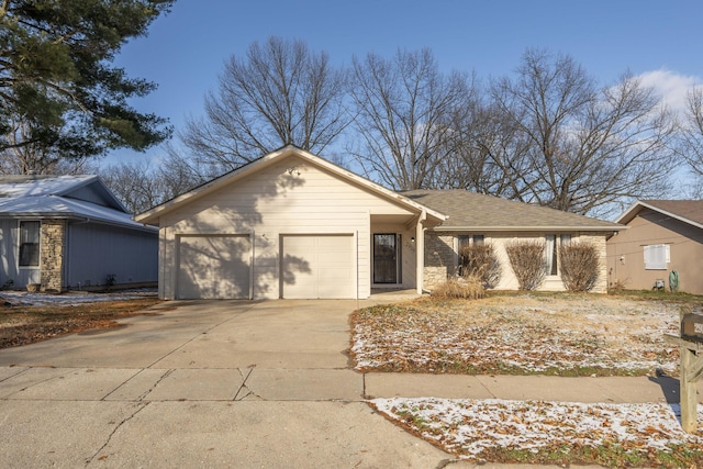 single story home featuring a garage