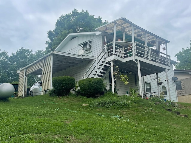 view of side of property with a yard