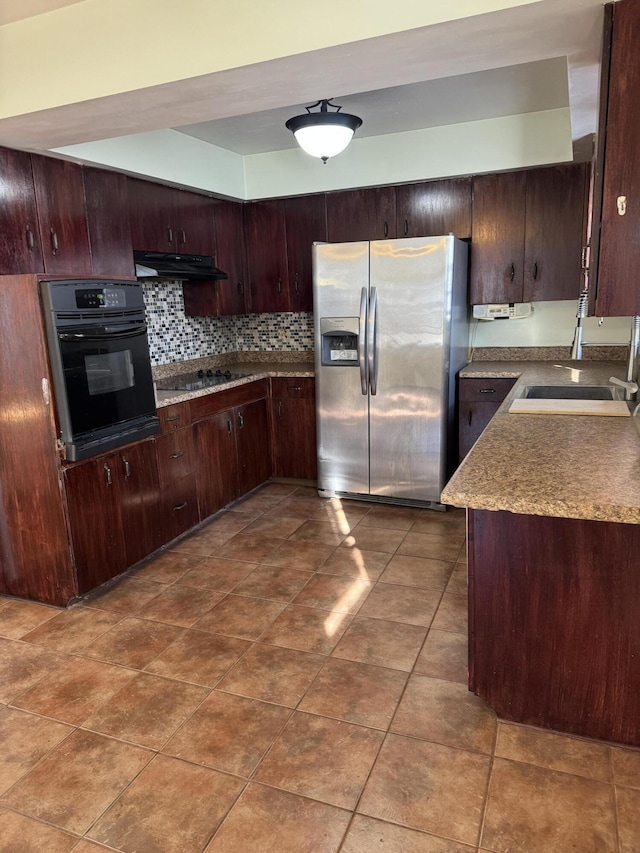 kitchen with sink, black appliances, decorative backsplash, and dark brown cabinetry