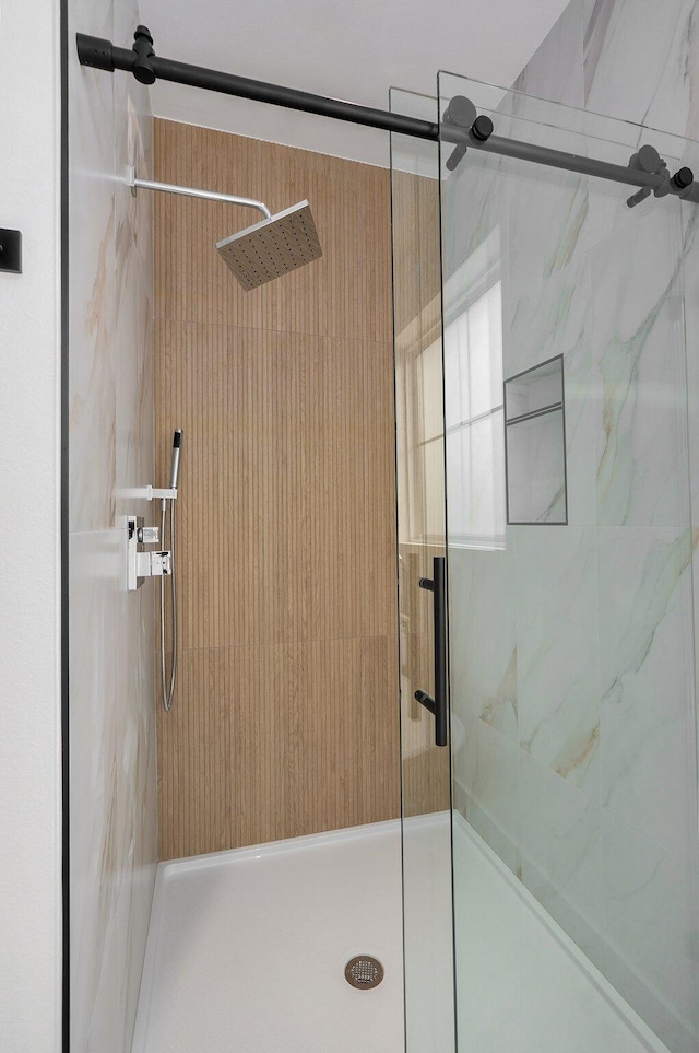 bathroom with an enclosed shower