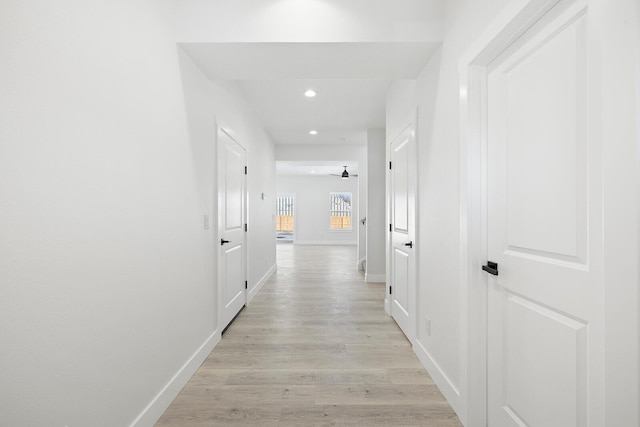 corridor featuring light hardwood / wood-style flooring