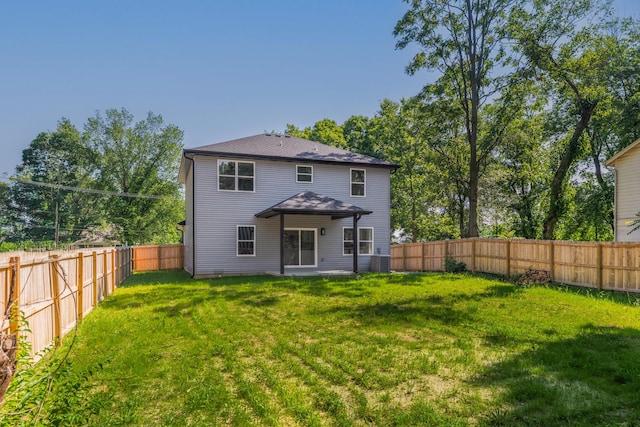 1309 E Blaine St, Springfield, MO 65803 - back of property featuring a fenced backyard and a patio area