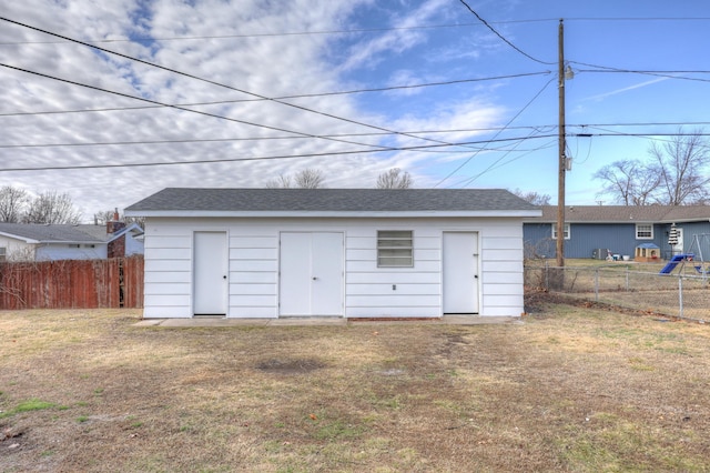 view of outdoor structure featuring a yard