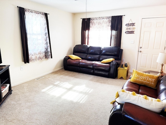 living room featuring light colored carpet