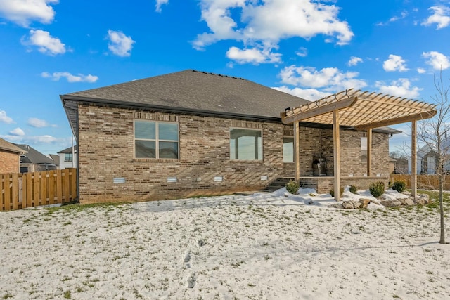 rear view of house with a pergola