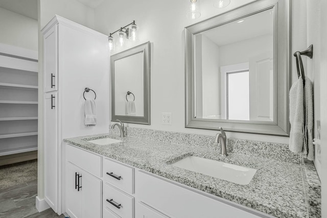 bathroom featuring vanity and hardwood / wood-style floors