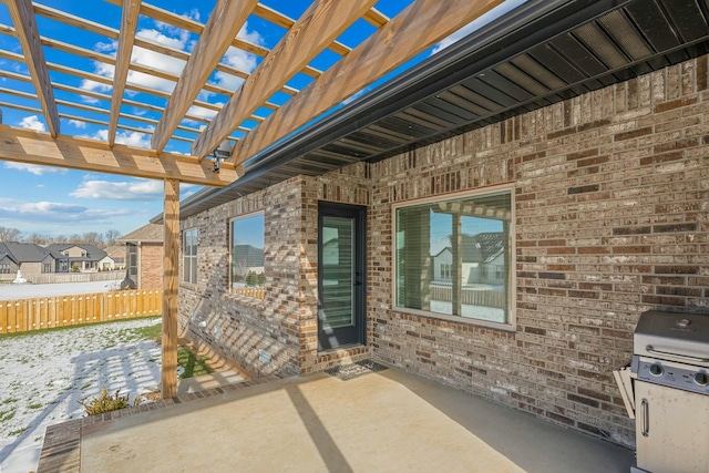 view of patio / terrace with a pergola and grilling area