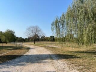 view of road with a rural view