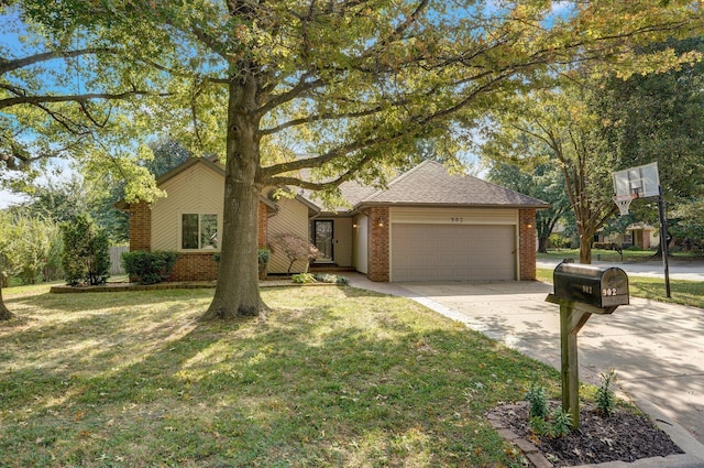 ranch-style home with a front yard and a garage