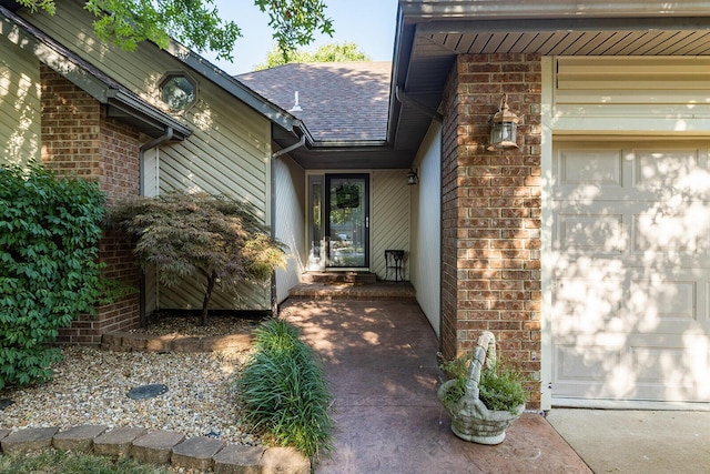 entrance to property featuring a garage