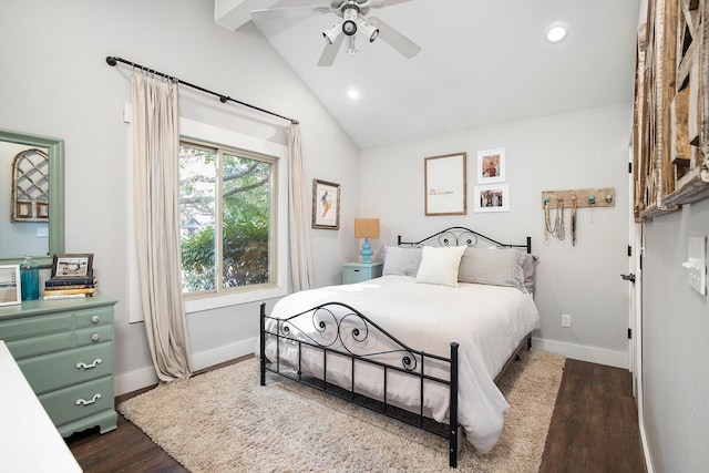 bedroom with dark hardwood / wood-style flooring, vaulted ceiling with beams, and ceiling fan