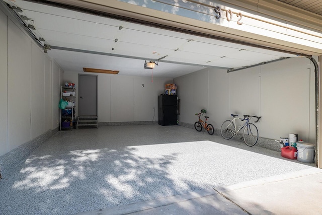 garage featuring a garage door opener