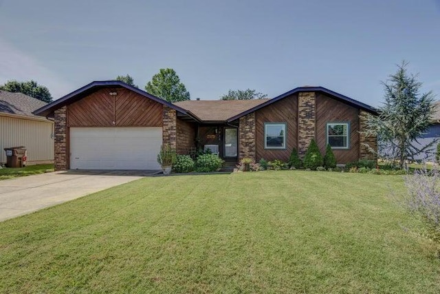 ranch-style home with a front lawn and a garage