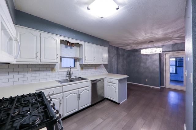 kitchen with sink, white cabinets, dishwasher, and dark wood-type flooring