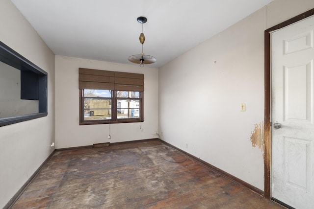 spare room with dark wood-type flooring