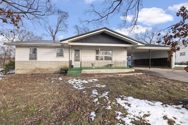 view of front of house with a carport