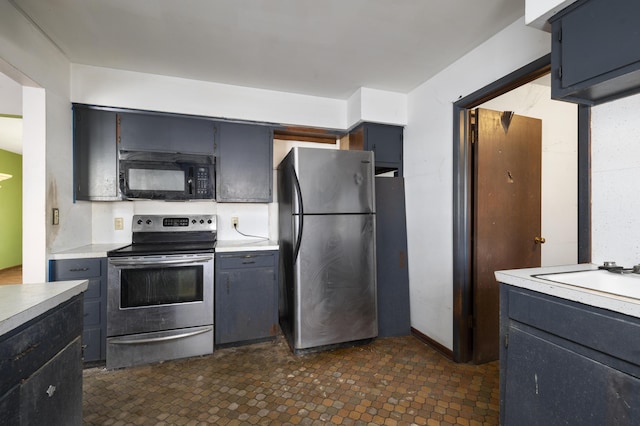 kitchen featuring appliances with stainless steel finishes and sink