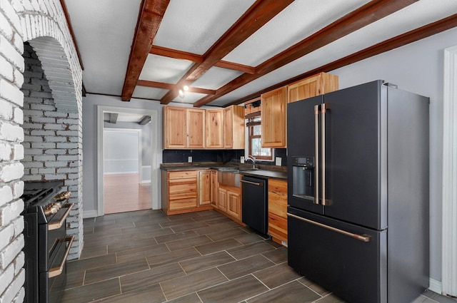 kitchen featuring beam ceiling, black appliances, light brown cabinets, dark countertops, and wood tiled floor