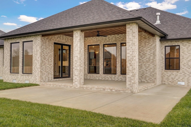 back of property featuring a patio area