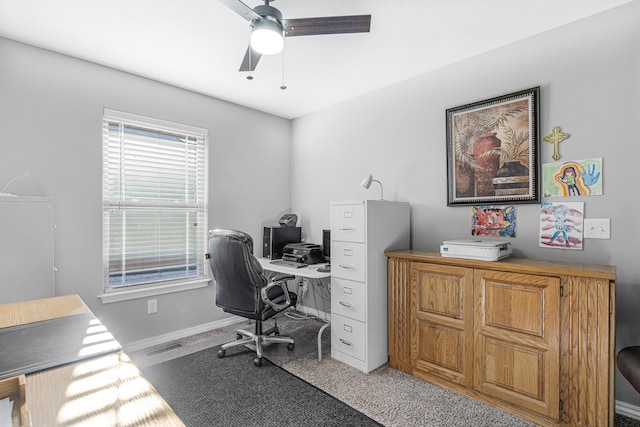 office with ceiling fan and carpet flooring