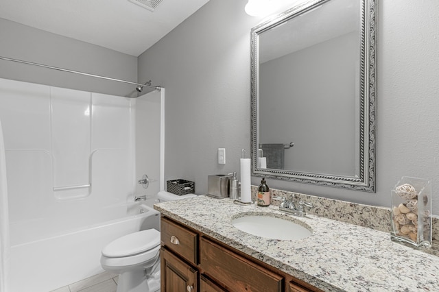 full bathroom with toilet, vanity, tile patterned flooring, and shower / bathing tub combination