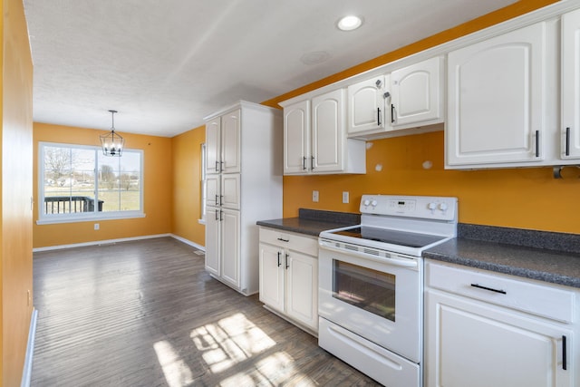 kitchen with white electric range, wood-type flooring, white cabinetry, an inviting chandelier, and hanging light fixtures