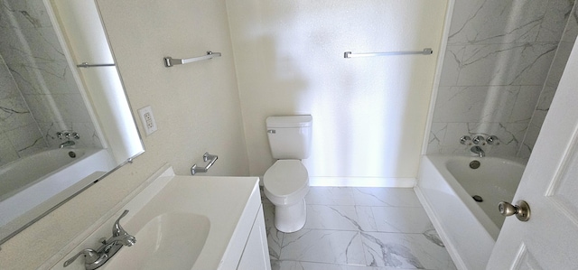 full bathroom featuring toilet, vanity, and tiled shower / bath combo