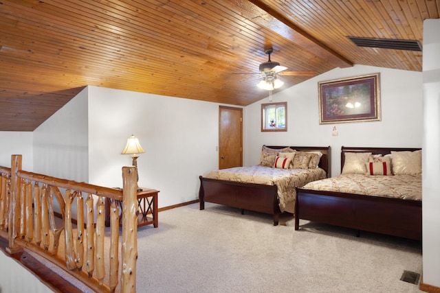 bedroom with lofted ceiling with beams, ceiling fan, wood ceiling, and light colored carpet