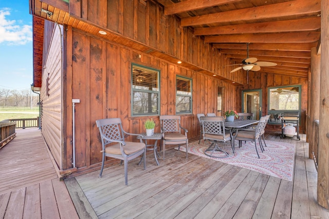 wooden deck with ceiling fan