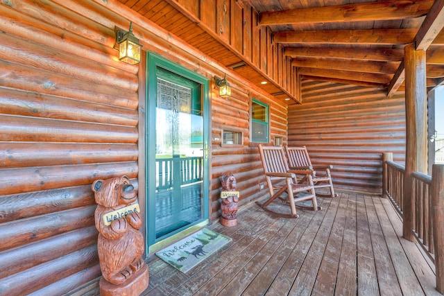 entrance to property with a porch