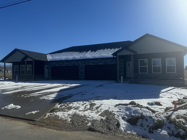 view of front of property featuring a garage